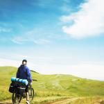 mountains_slopes_travel_bicycle_back_girl_55782_1920x1080